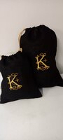 jute zak met gouden sierletter