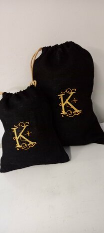 jute zak met gouden sierletter